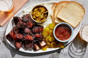 Pork Belly Burnt Ends with pickles and white bread